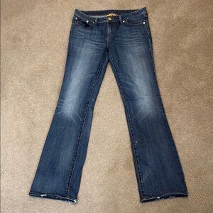 Tory Burch Boot Cut Jeans with Vintage Wash